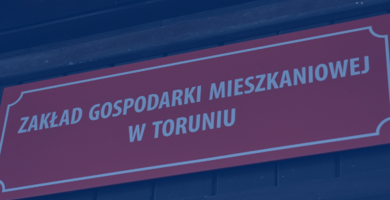 Zdjęcie szyldu Zakładu Gospodarki Mieszkaniowej w Toruniu