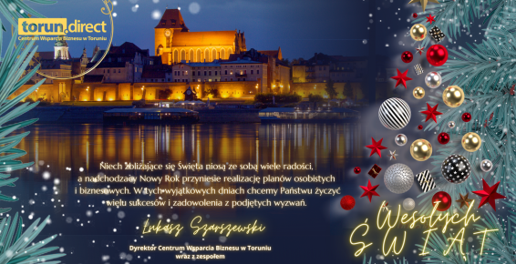 Zdjęcie panoramy Torunia z tekstem świątecznych życzeń
